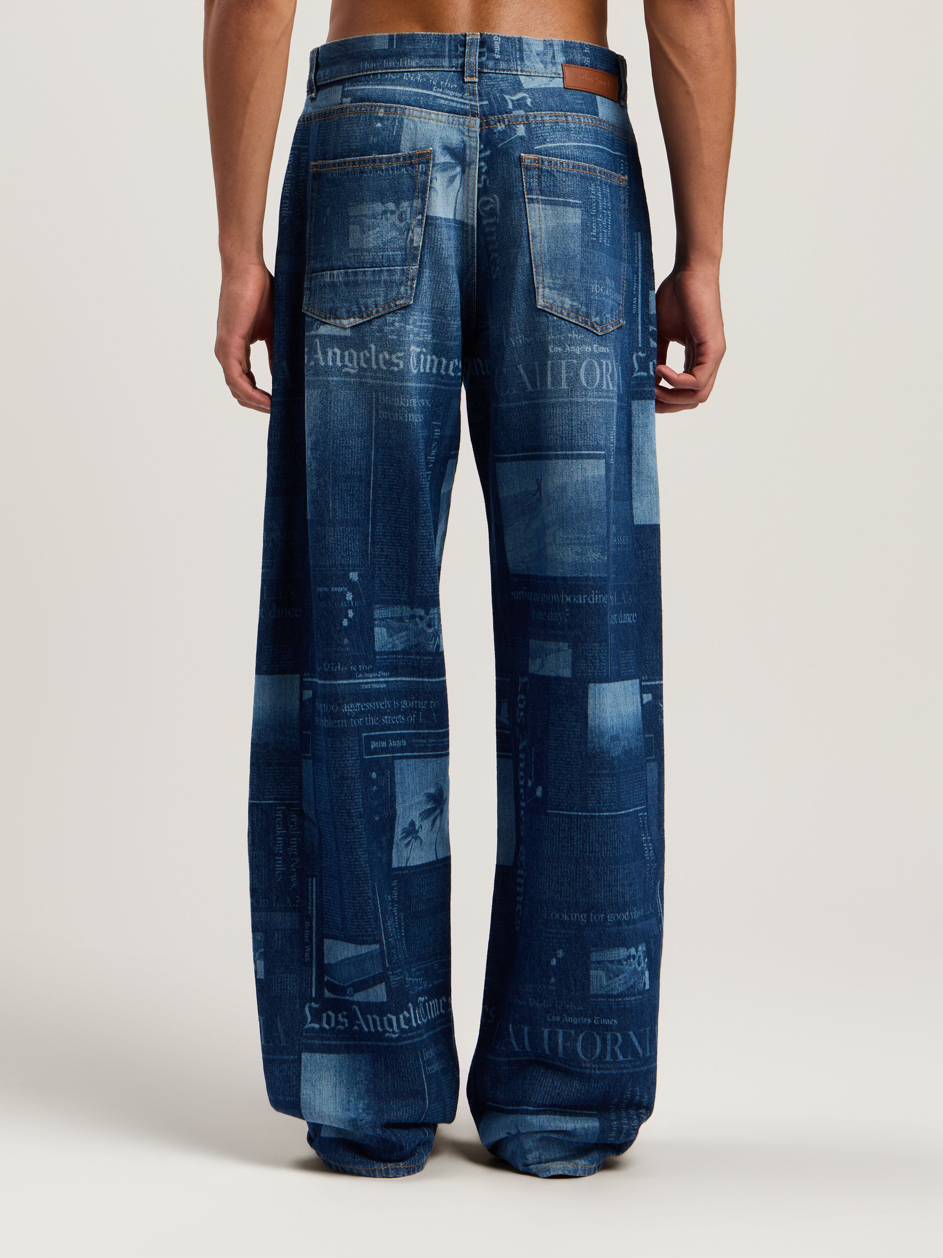 PALM ANGELS News Print Loose Denim Pants MEDIUM BLUE - DUSTY BLUE PMYA049F25DEN002