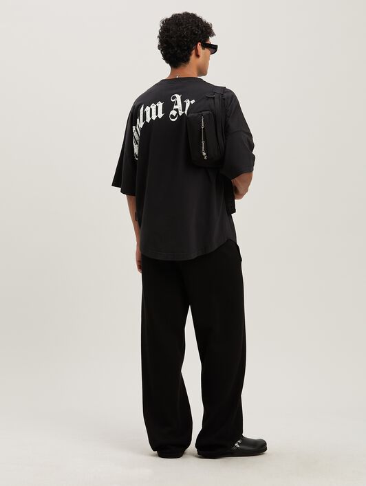 PALM ANGELS Oversize T-Shirt mit geschwungenem Logo BLACK - OFF WHITE PMAA002S25JER001