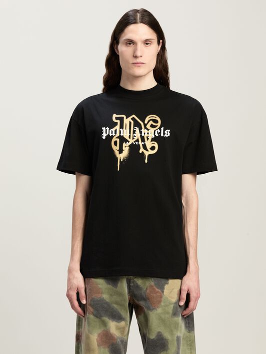 Las Vegas Monogram Spray Tee PALM ANGELS Las Vegas Monogram Spray Tee BLACK - GOLD PMAA001C99JER031