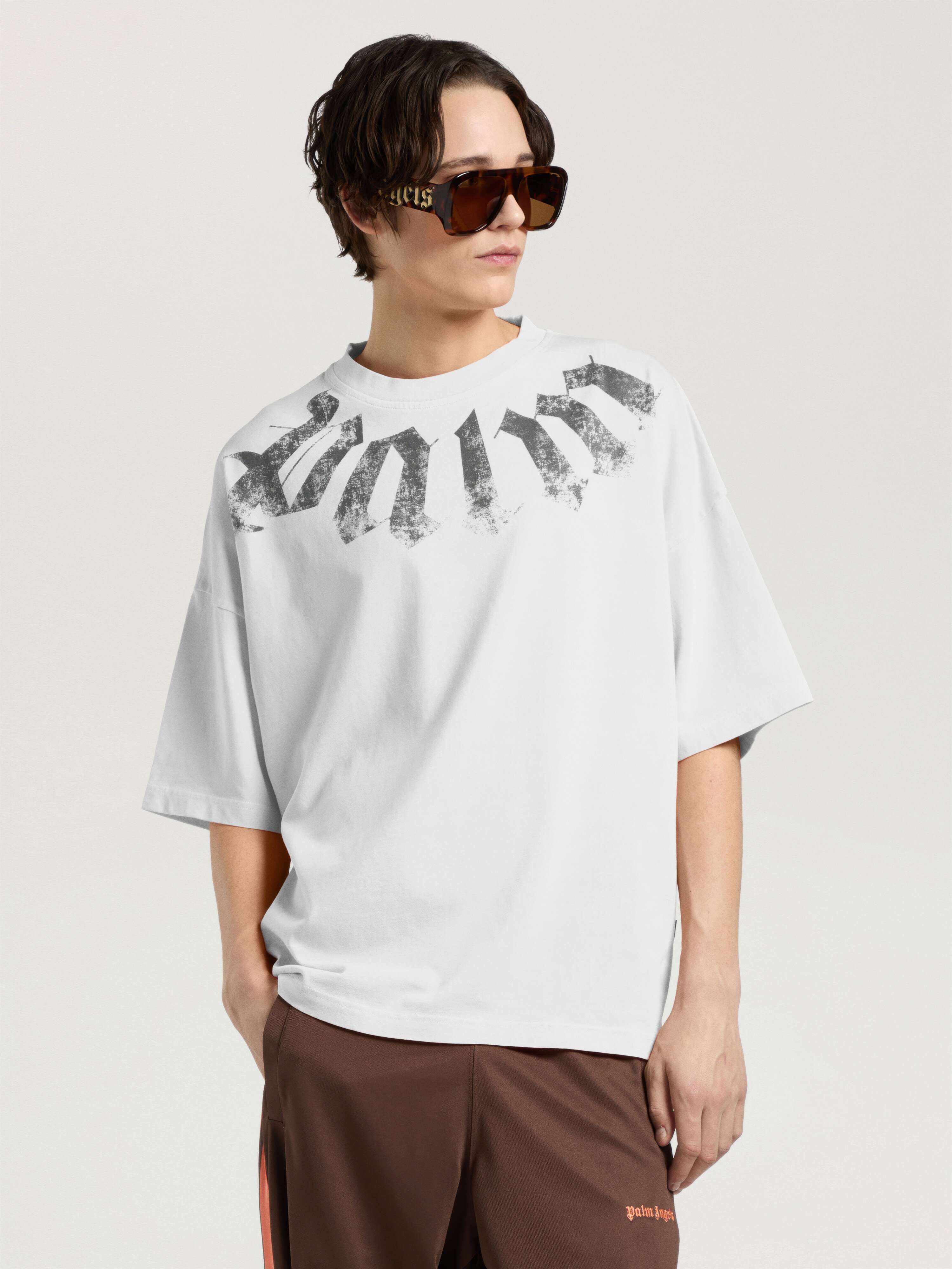 Big Neck Logo Loose T-Shirt PALM ANGELS Big Neck Logo Loose T-Shirt OFF WHITE - BLACK PAMAA03F26JR01