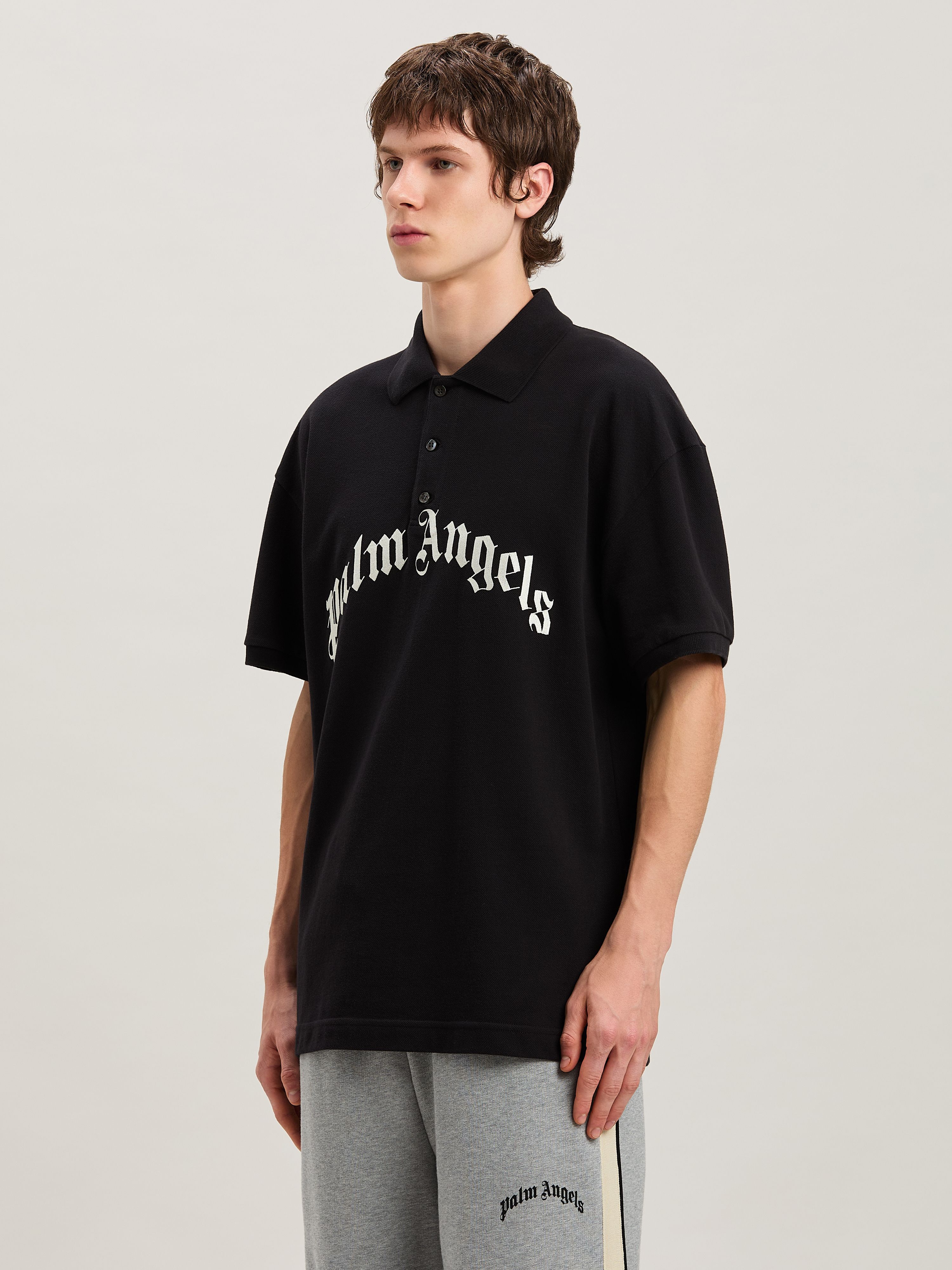 PALM ANGELS  Curved Logo polo shirt BLACK - OFF WHITE PMGB012S25FAB003