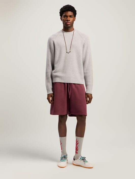 Curved Logo Ribbed Sweater PALM ANGELS Curved Logo Ribbed Sweater GREY MELANGE - OFF WHITE PMHE083F25KNI001
