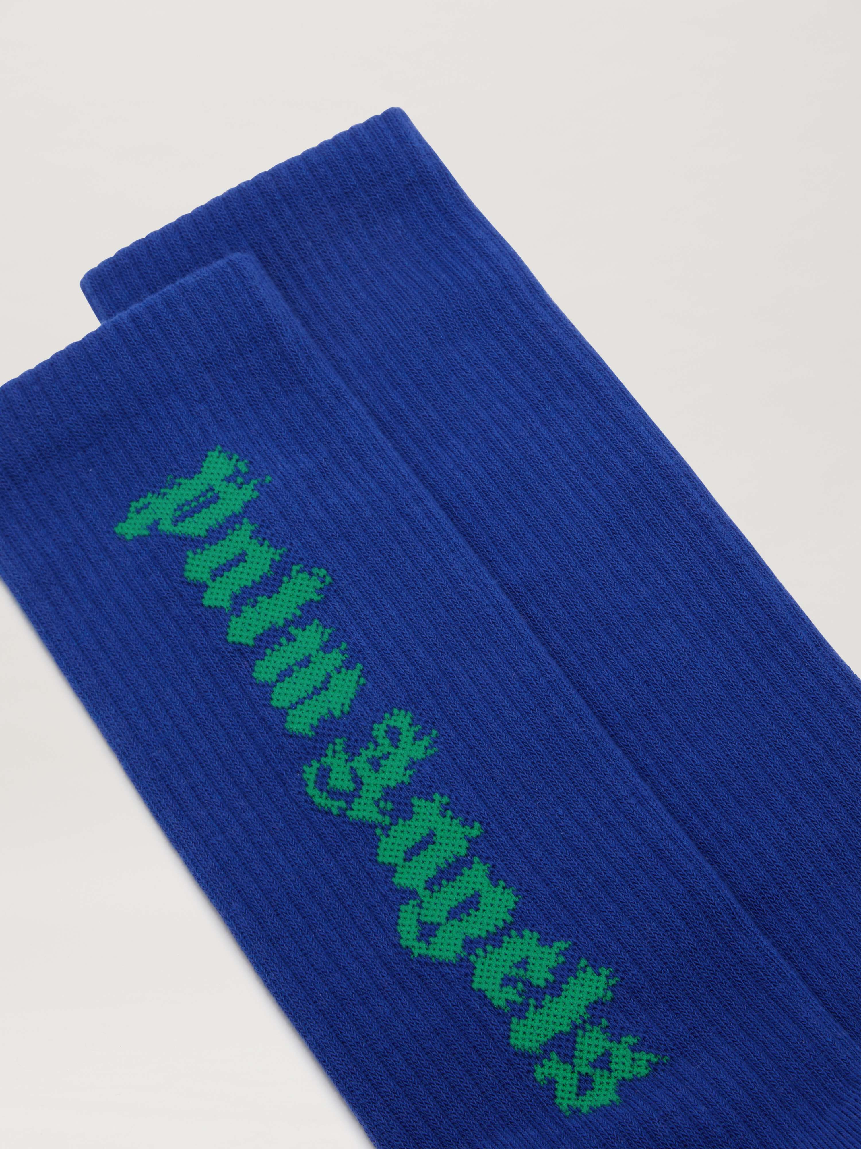 PALM ANGELS  LOGO FLAMES SOCKS BLUE PMRA001S25FAB003