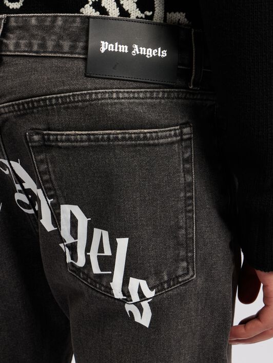 PALM ANGELS Curved Logo Denim Jeans BLACK WHITE PMYA012C99DEN001