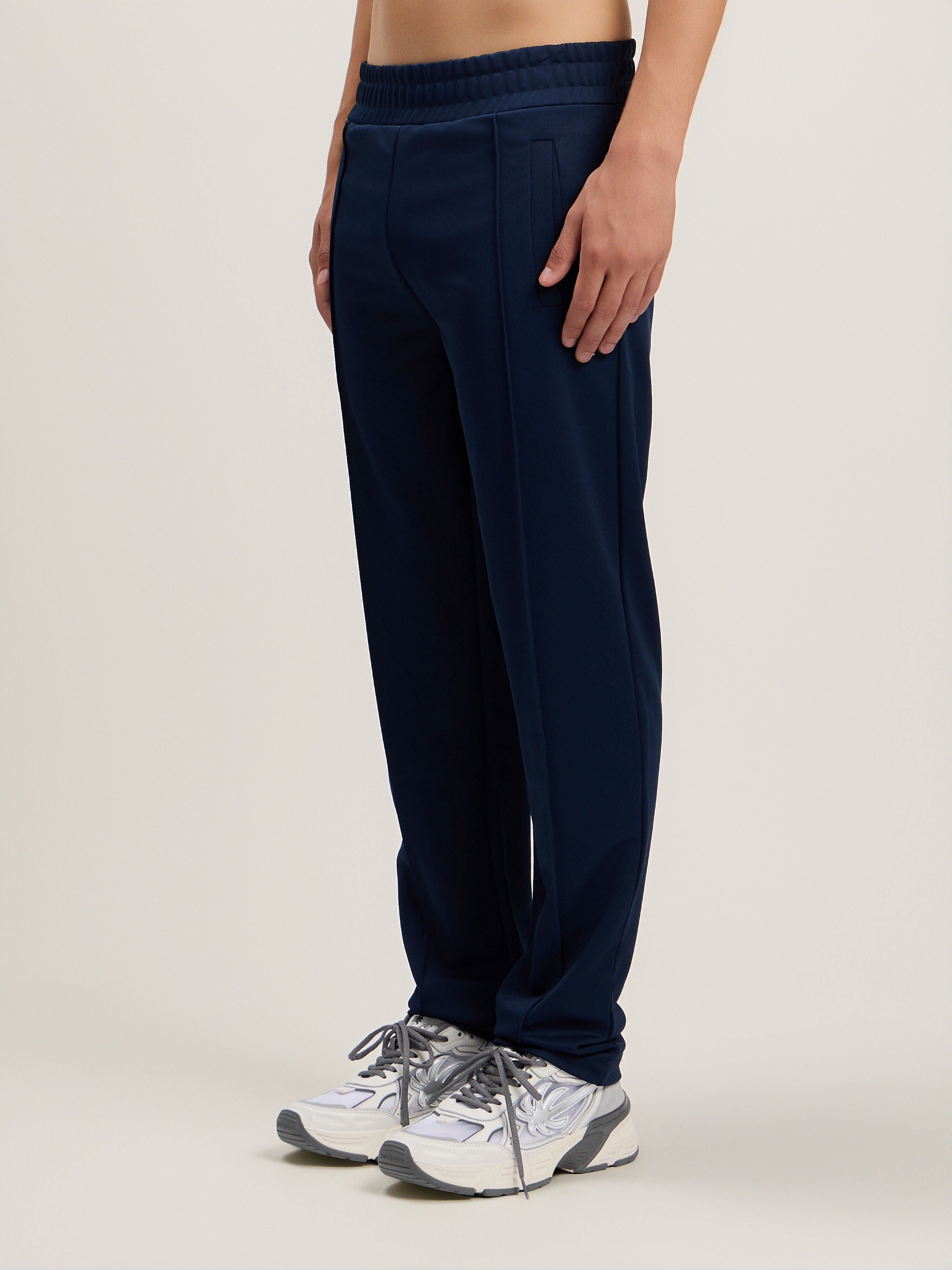 Back Curved Logo Track Pants in NAVY BLUE OFF WHITE for Men | Palm