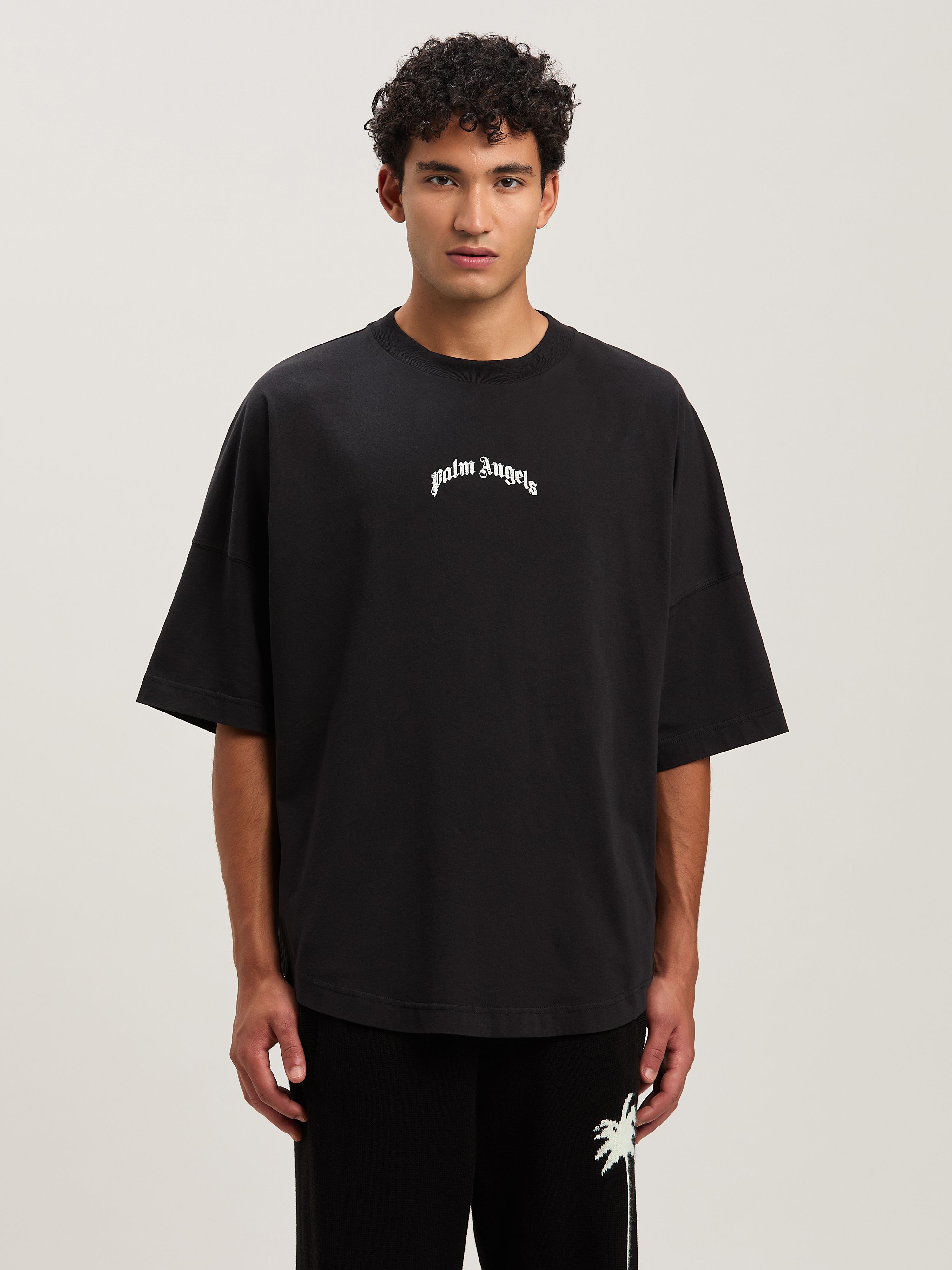 PALM ANGELS Oversize T-Shirt mit geschwungenem Logo BLACK - OFF WHITE PMAA002S25JER001
