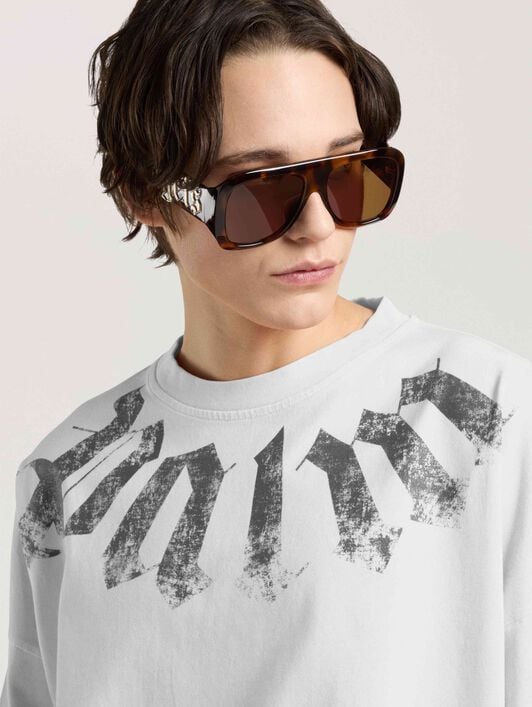 Big Neck Logo Loose T-Shirt PALM ANGELS Big Neck Logo Loose T-Shirt OFF WHITE - BLACK PAMAA03F26JR01
