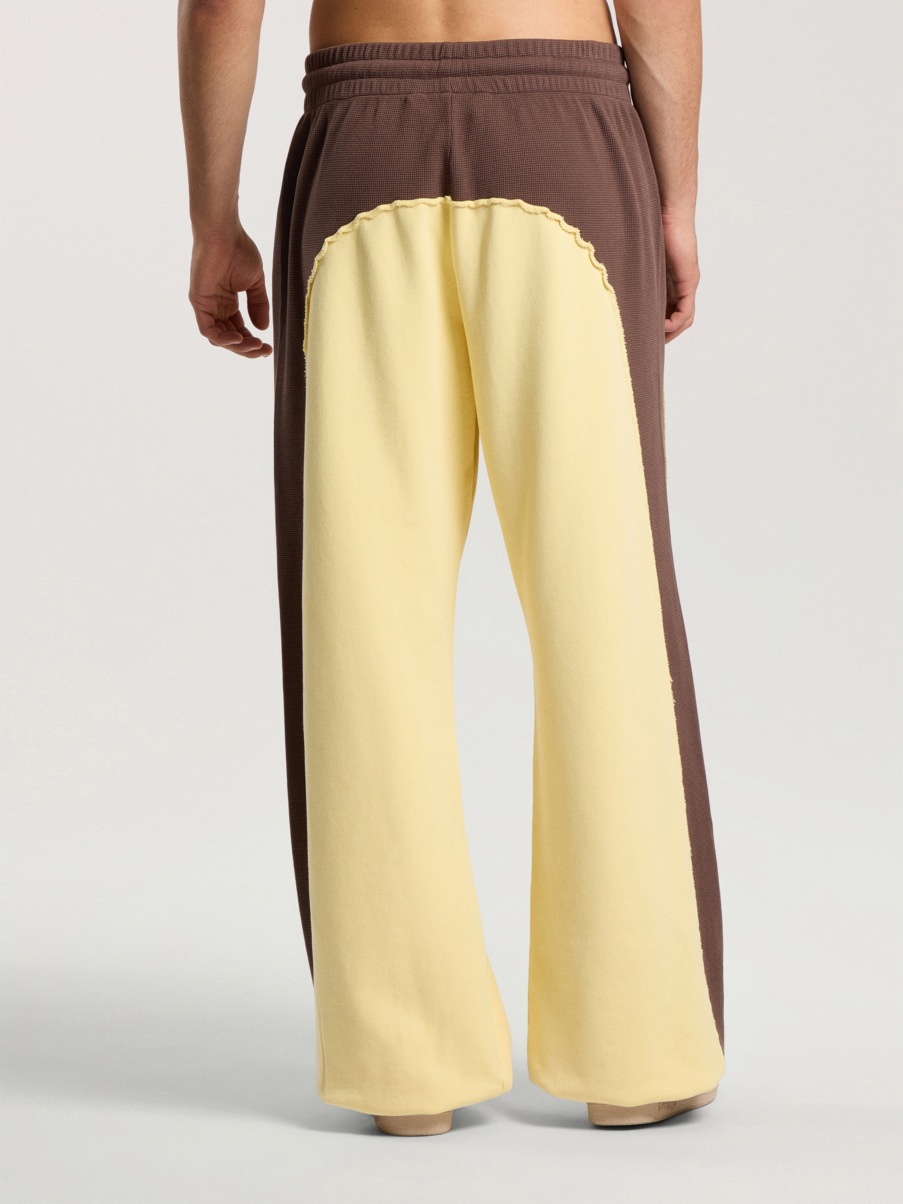 Vintage Logo Loose Sweatpants PALM ANGELS Vintage Logo Loose Sweatpants BROWN - LIGHT YELLOW PAMCH03F26FL01