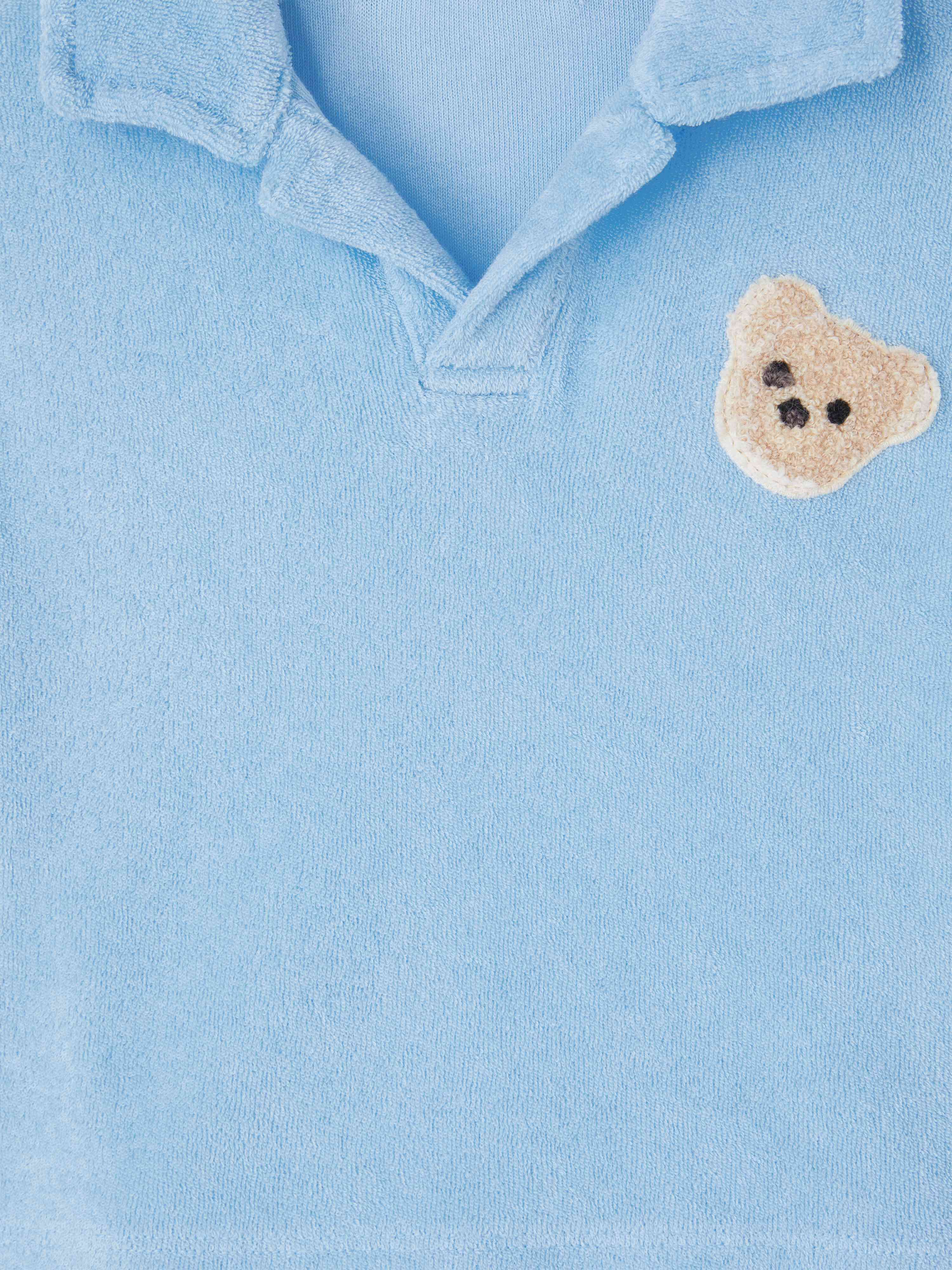 PALM ANGELS  Teddy-Bär Frottee-Polo-Shirt LIGHT BLUE BROWN PBBX001S25FLE001