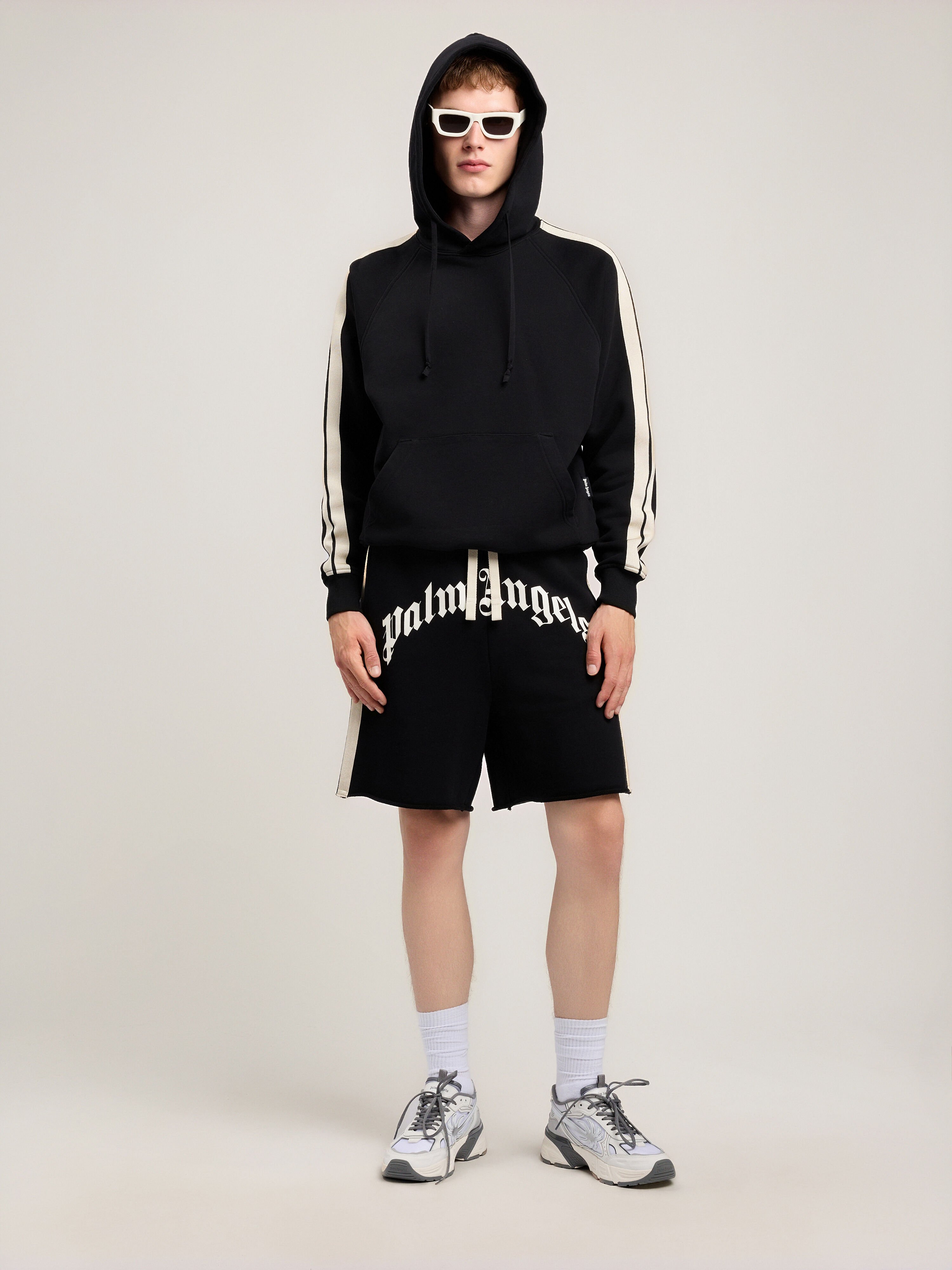 Curved Logo Track Sweatshorts PALM ANGELS Curved Logo Track Sweatshorts BLACK OFF WHITE PMCI02DS26FLE001