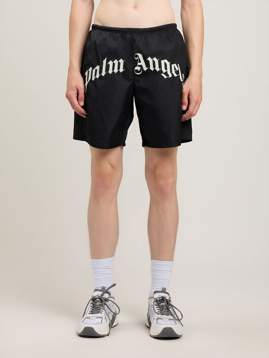 PALM ANGELS Curved Logo Swimshorts BLACK OFF WHITE PMFD018S26FAB001