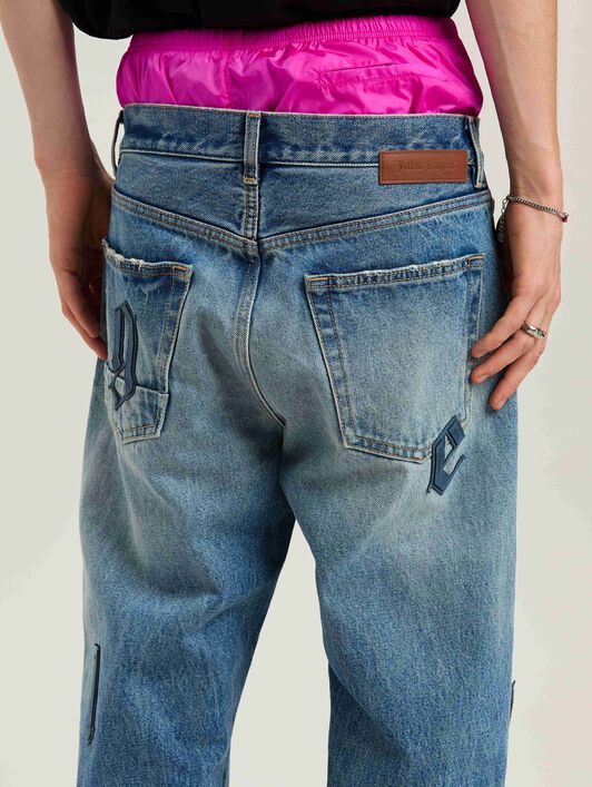 PALM ANGELS  Logo Patch denim pants LIGHT BLUE - LIGHT BLUE PMYA041S25DEN006