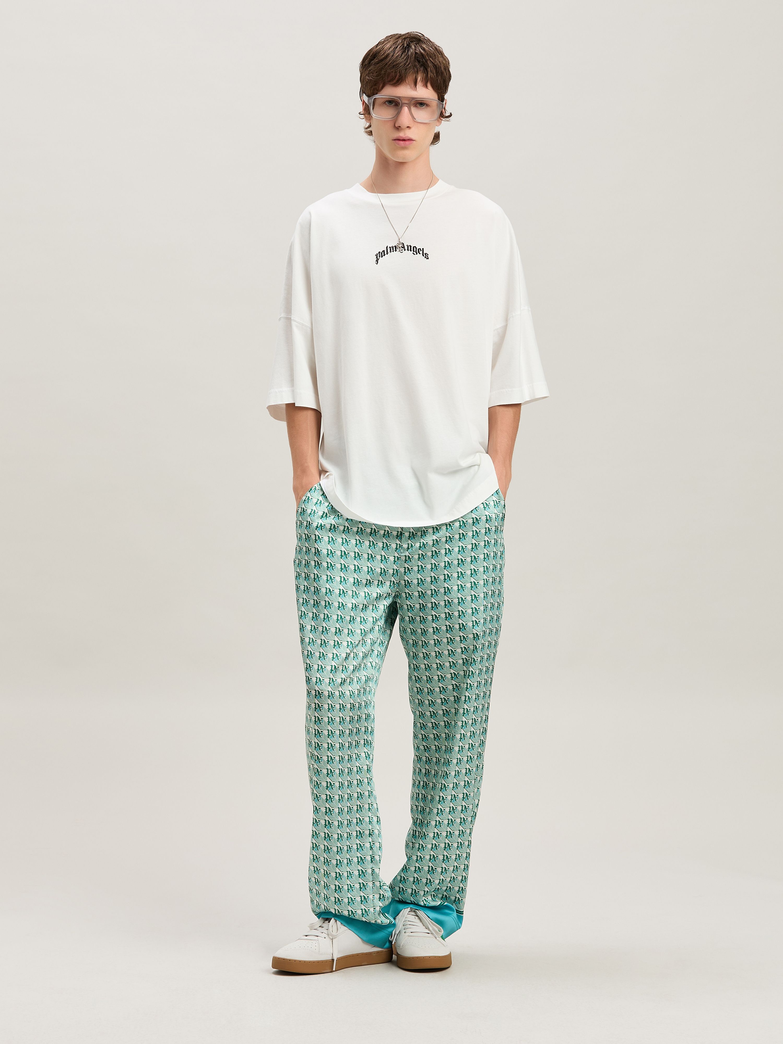 PALM ANGELS Curved logo Oversize T-shirt OFF WHITE - NERO PMAA002S25JER001