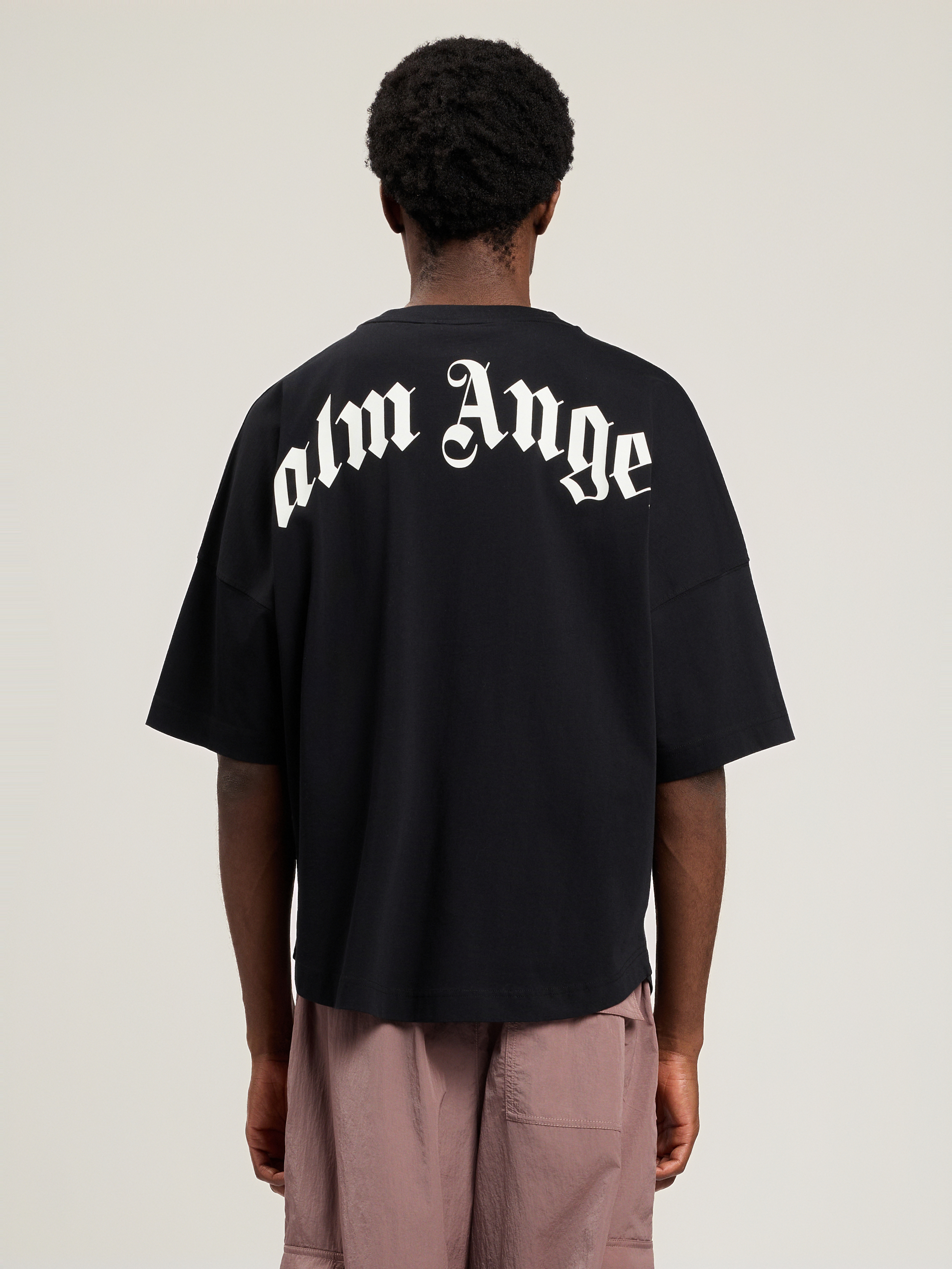 Palm Angels "back Curved Logo Oversized" Short Sleeves T-shirt Clothing In Black