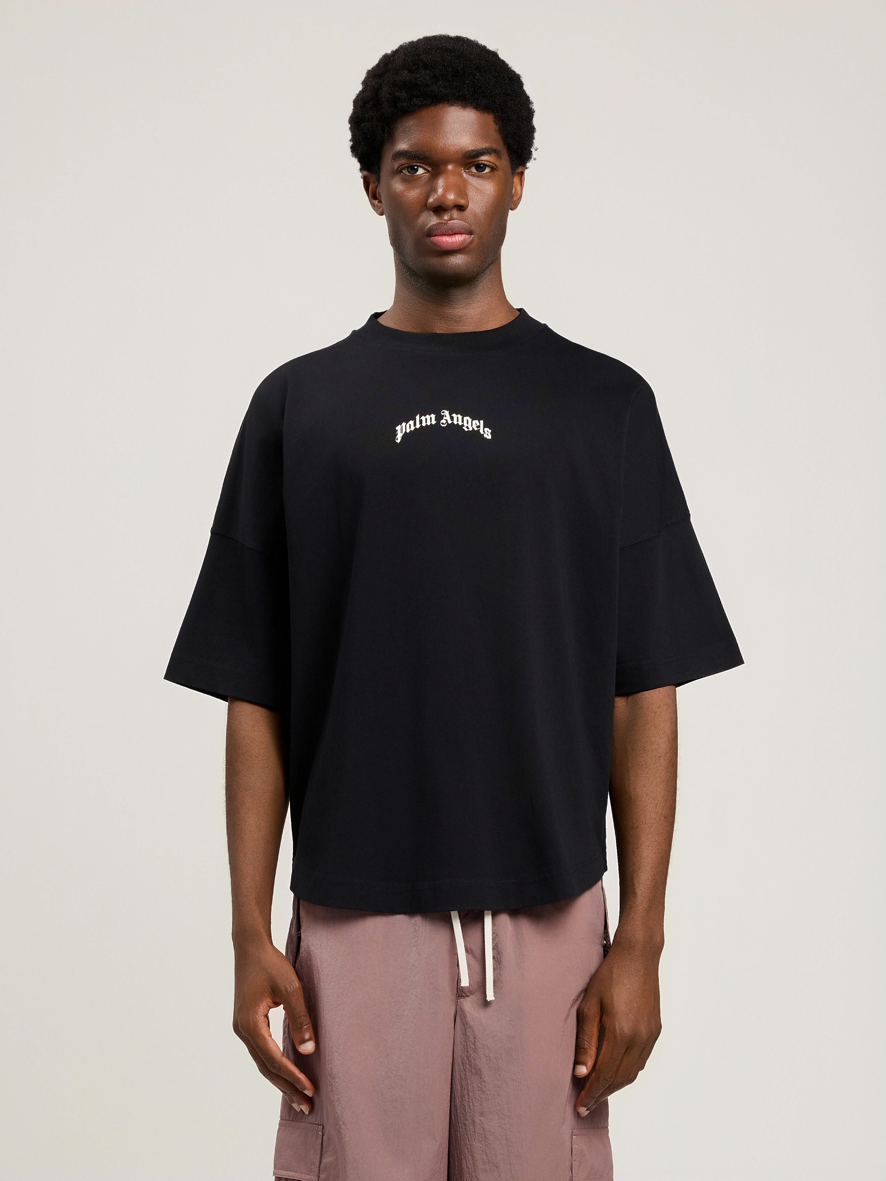 Palm Angels "back Curved Logo Oversized" Short Sleeves T-shirt Clothing In Black