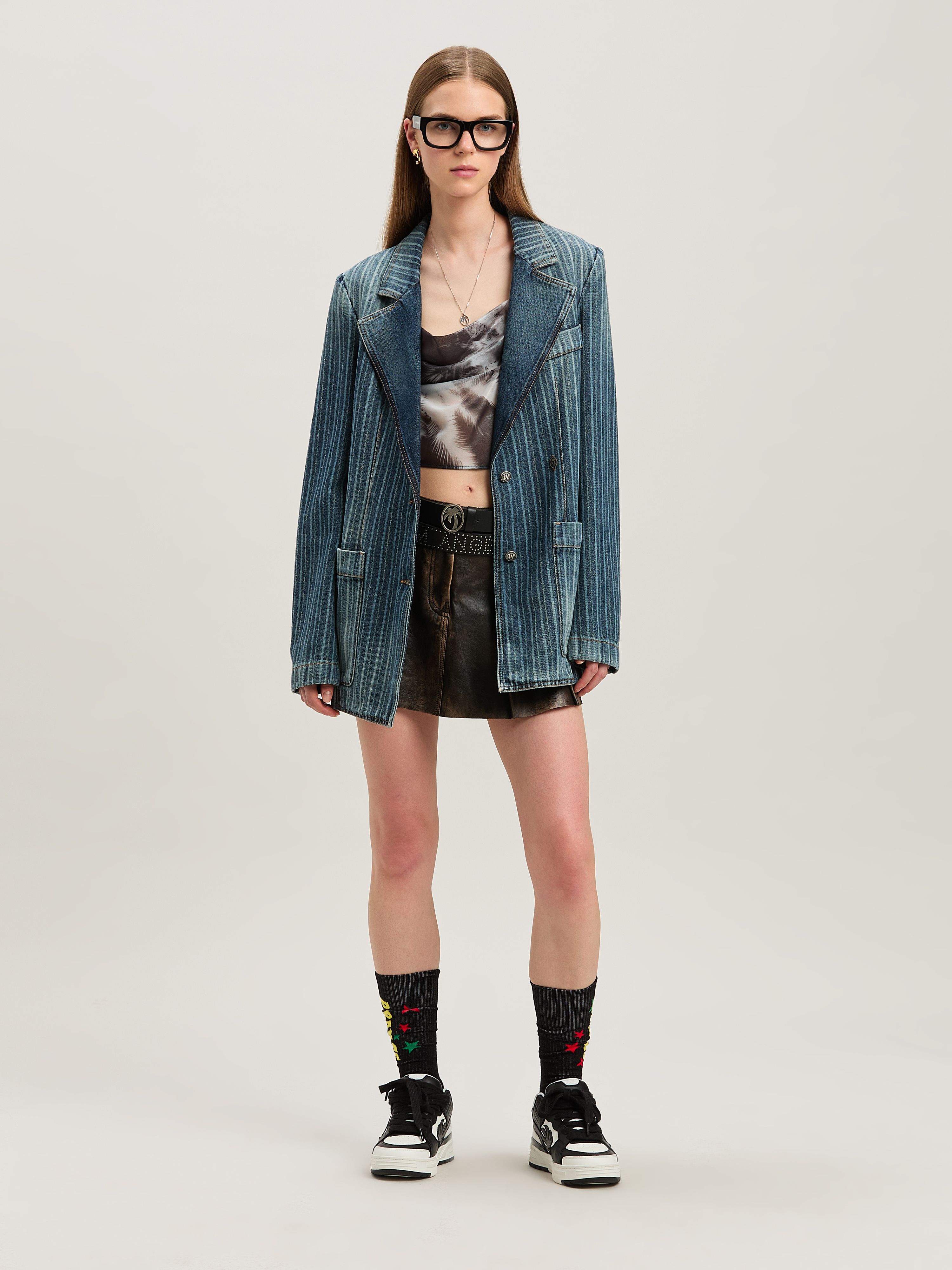 Shop Palm Angels Curved Logo Leather Miniskirt