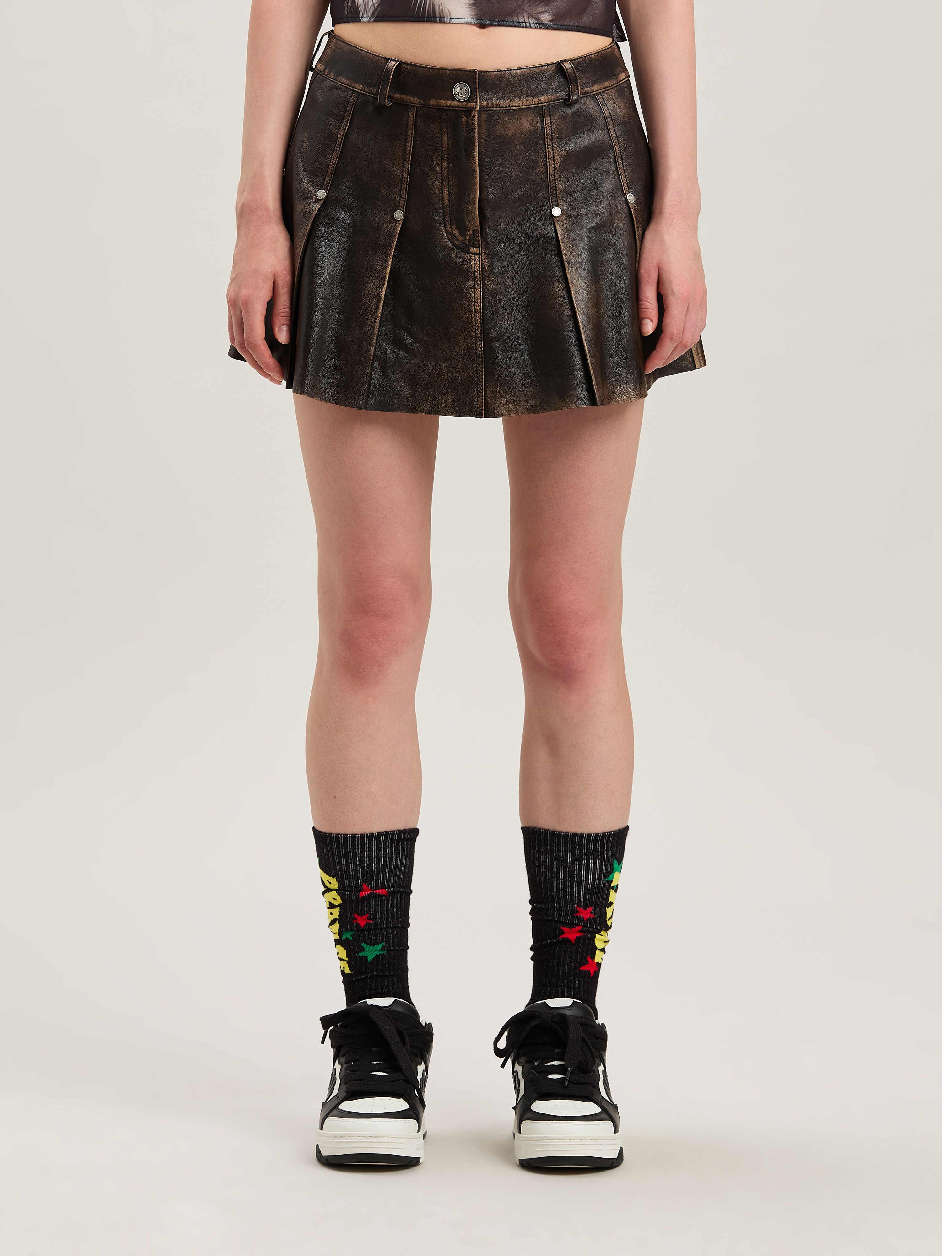 Shop Palm Angels Curved Logo Leather Miniskirt