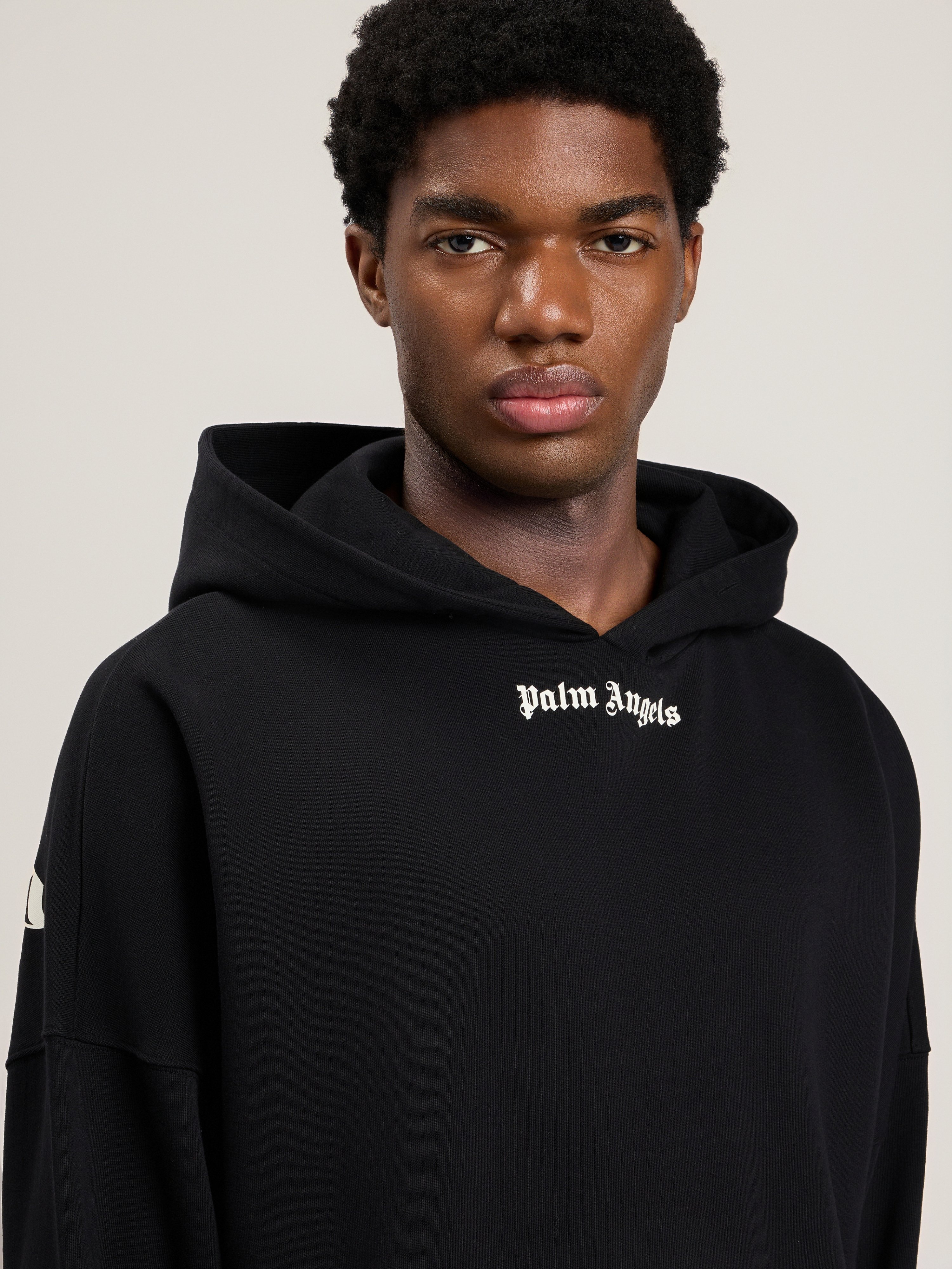 Palm Angels Chic Mini Graphic Sweater For Men In Black