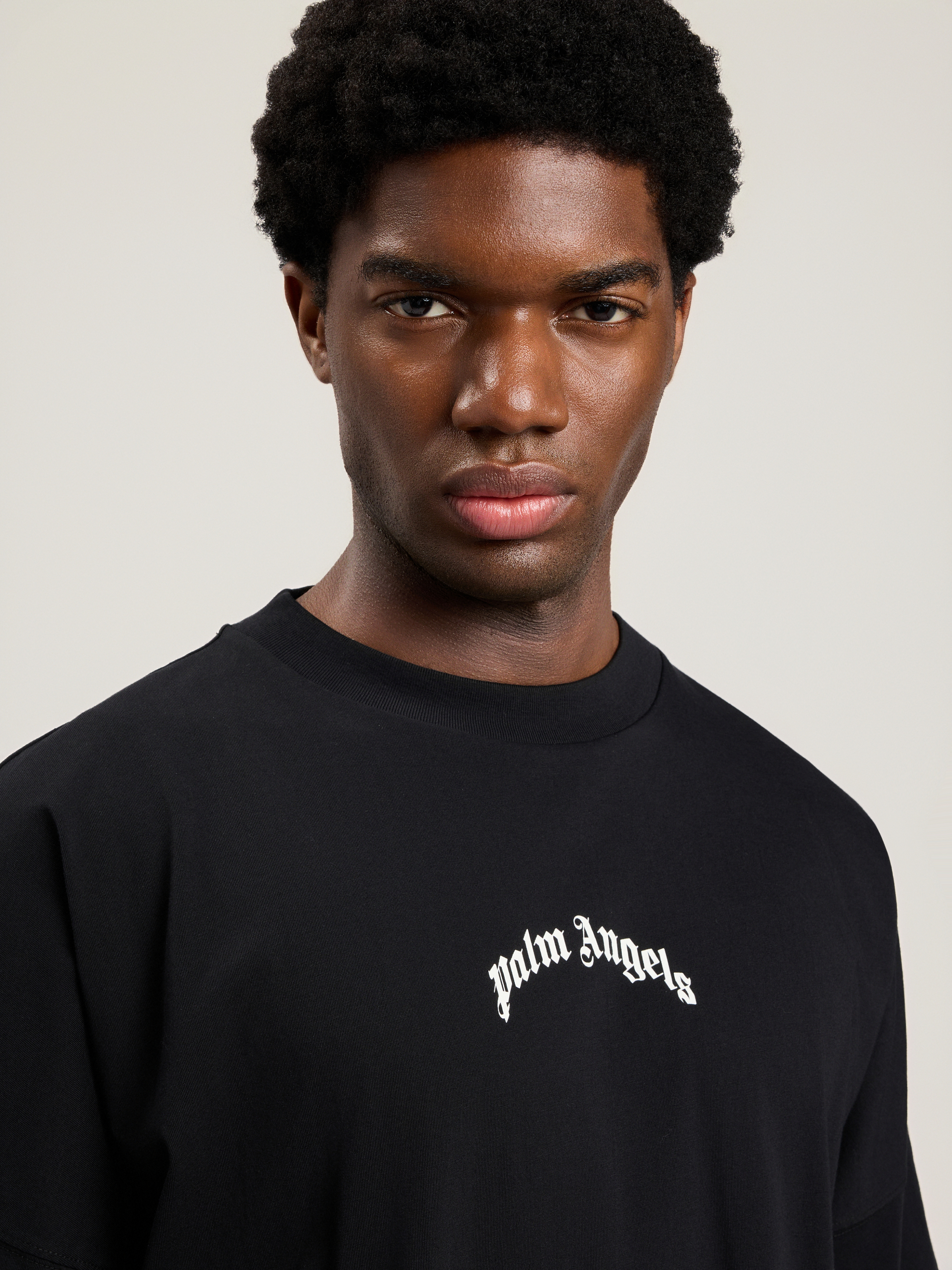 Palm Angels "back Curved Logo Oversized" Short Sleeves T-shirt Clothing In Black