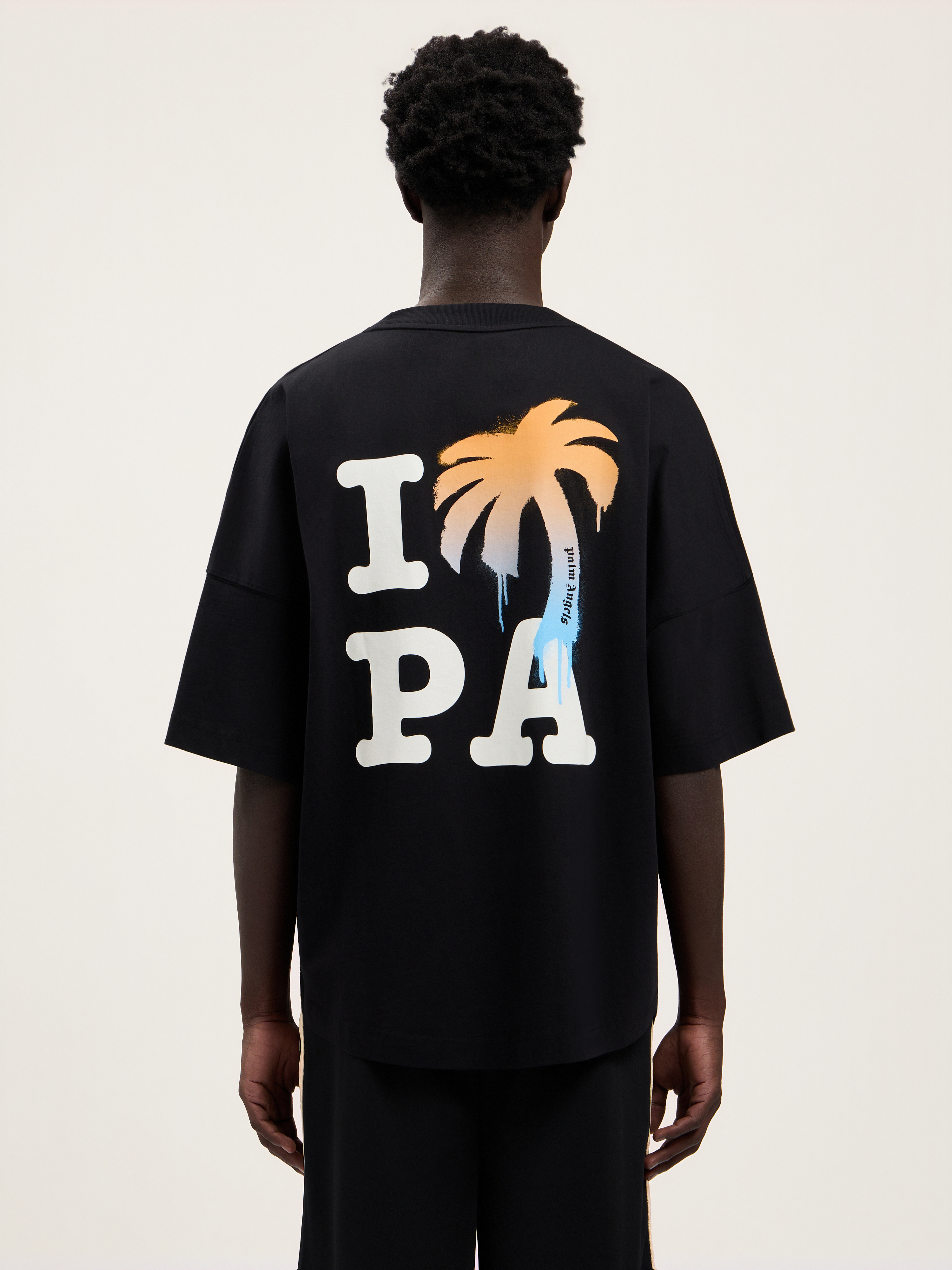 Palm Angels Oversized Black T-shirt With Graphic Palm Tree Design In Black