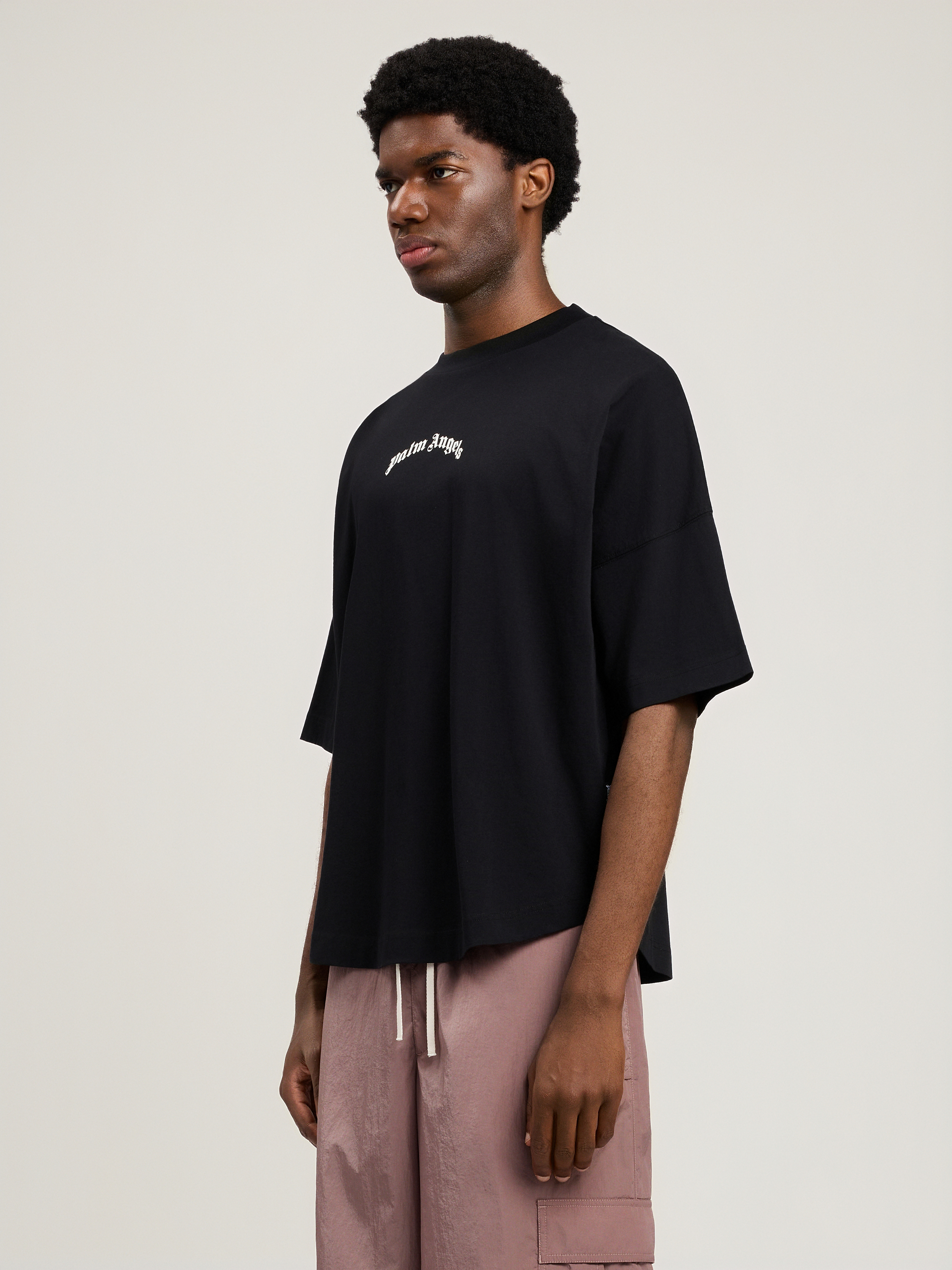 Palm Angels "back Curved Logo Oversized" Short Sleeves T-shirt Clothing In Black